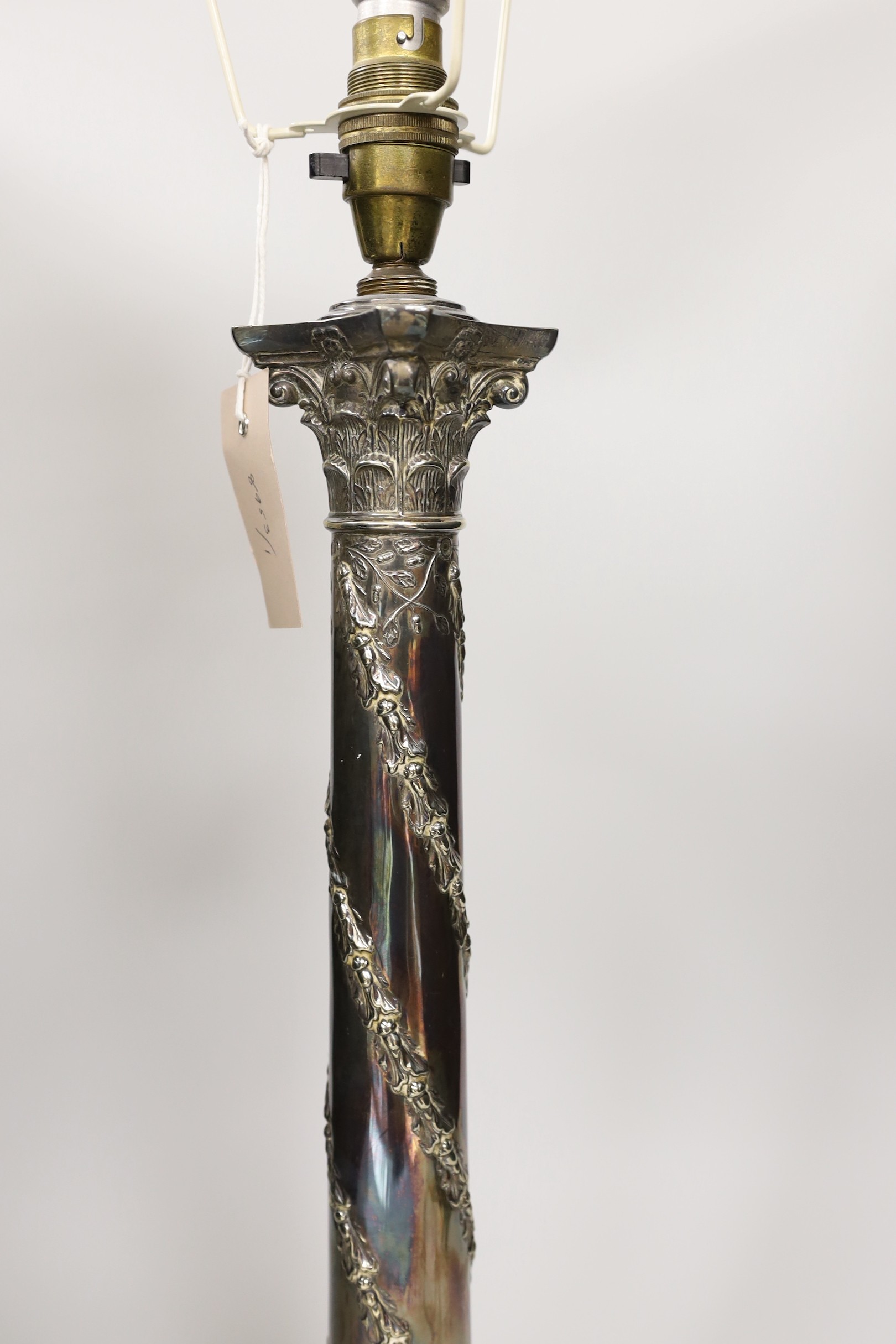 A Victorian silver plated Corinthian column table lamp, 45cm tall excl light fittings